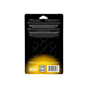 Black blister pack with circular compartments.