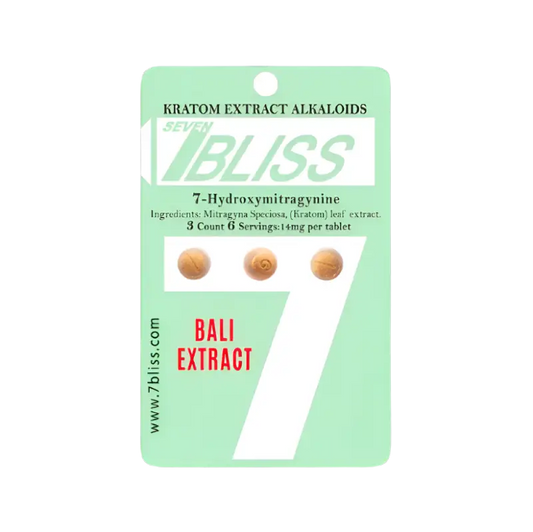 A green retail package containing Kratom extract alkaloid tablets labeled ’7BLISS Bali Extract.’