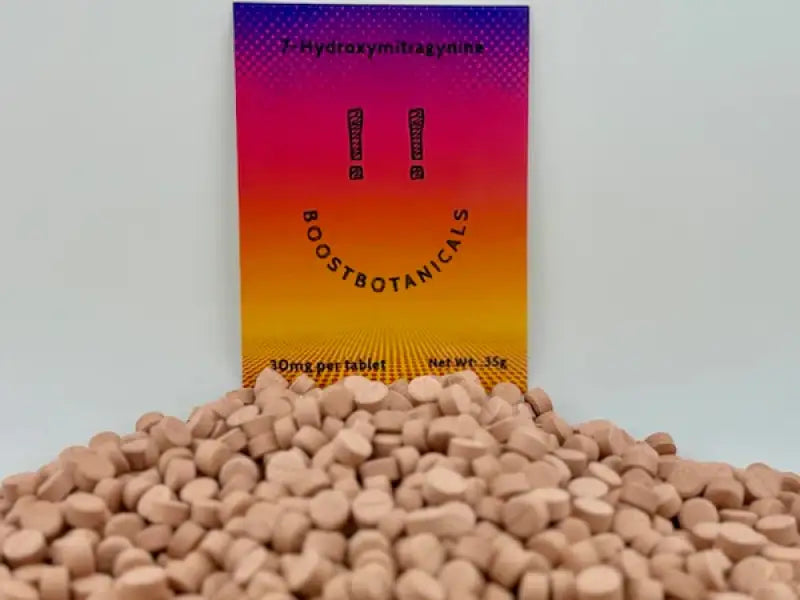 Pile of tan-colored tablets with a colorful product card.