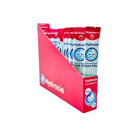 Red retail display box containing Hydroxie drink mix packets.