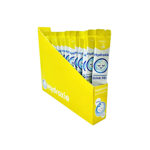 Yellow retail display box containing multiple Hydrozle drink mix packets.