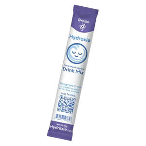 Purple packet of Hydrolife grape-flavored drink mix with a smiling face logo.