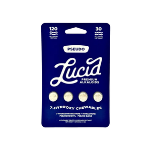 Dark blue product package containing four white circular tablets labeled ’Pseudo Lucid Premium Alkaloids’