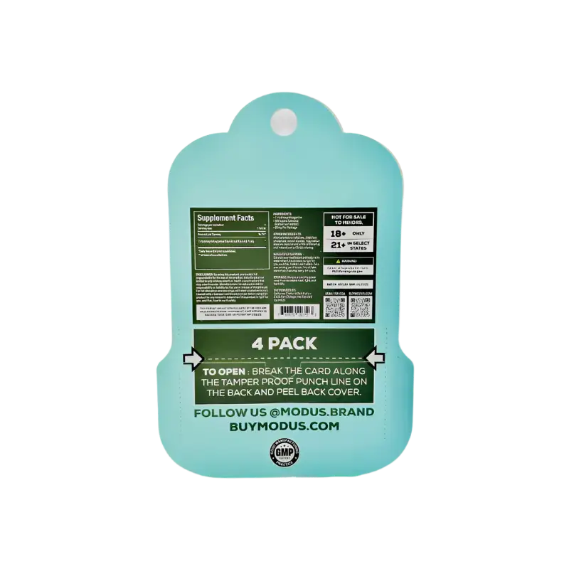 Mint green plastic cutting board with product information printed on it.