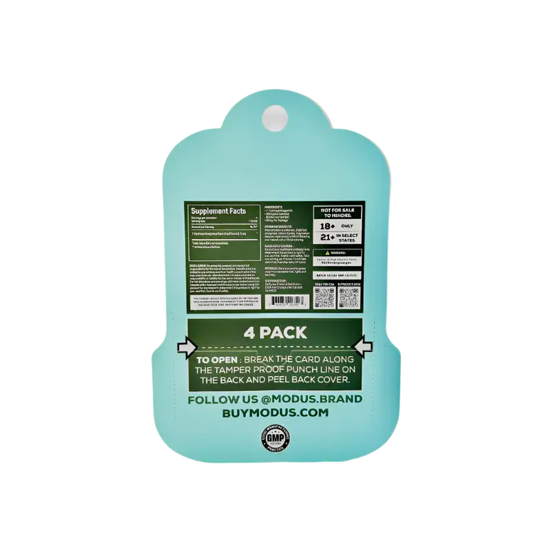 Mint green plastic cutting board with product information printed on the back.