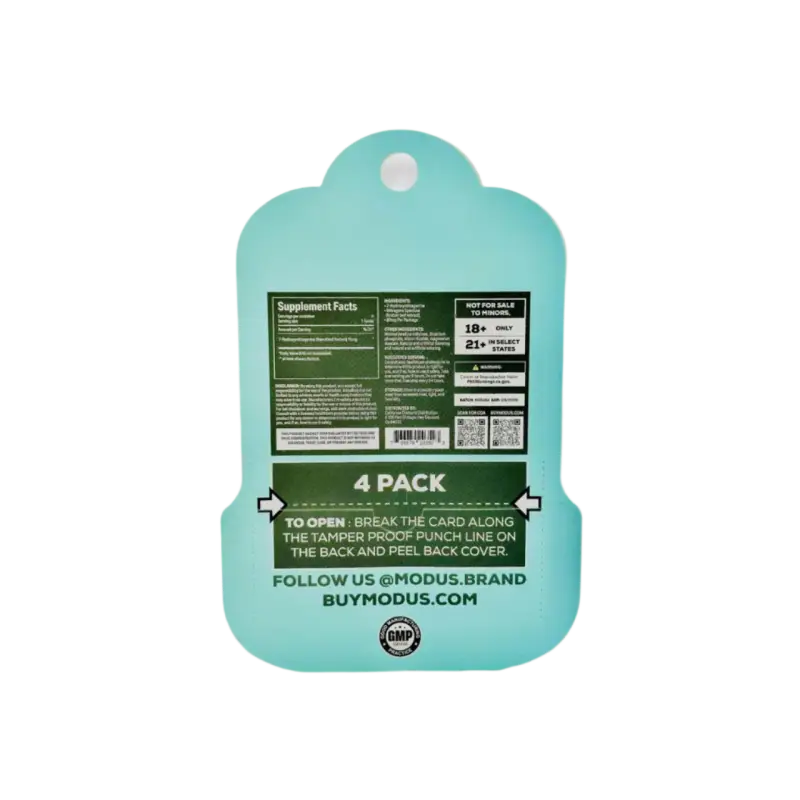 Mint green plastic cutting board with product information printed on the back.