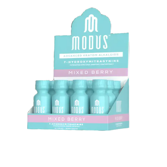 Display box containing Modus Mixed Berry drink bottles in turquoise and pink colors.