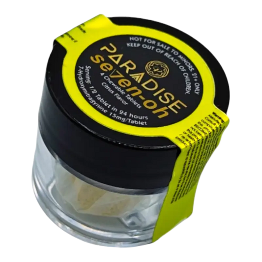 Glass jar with black lid and yellow label containing Paradise Selection cannabis product.