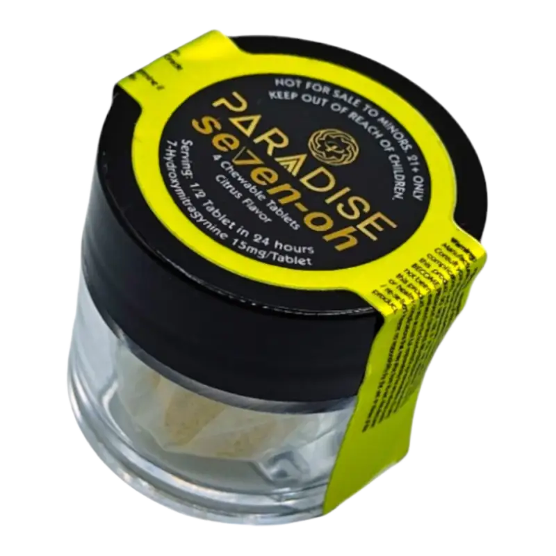 Glass jar with black lid and yellow label containing Paradise Selection cannabis product.