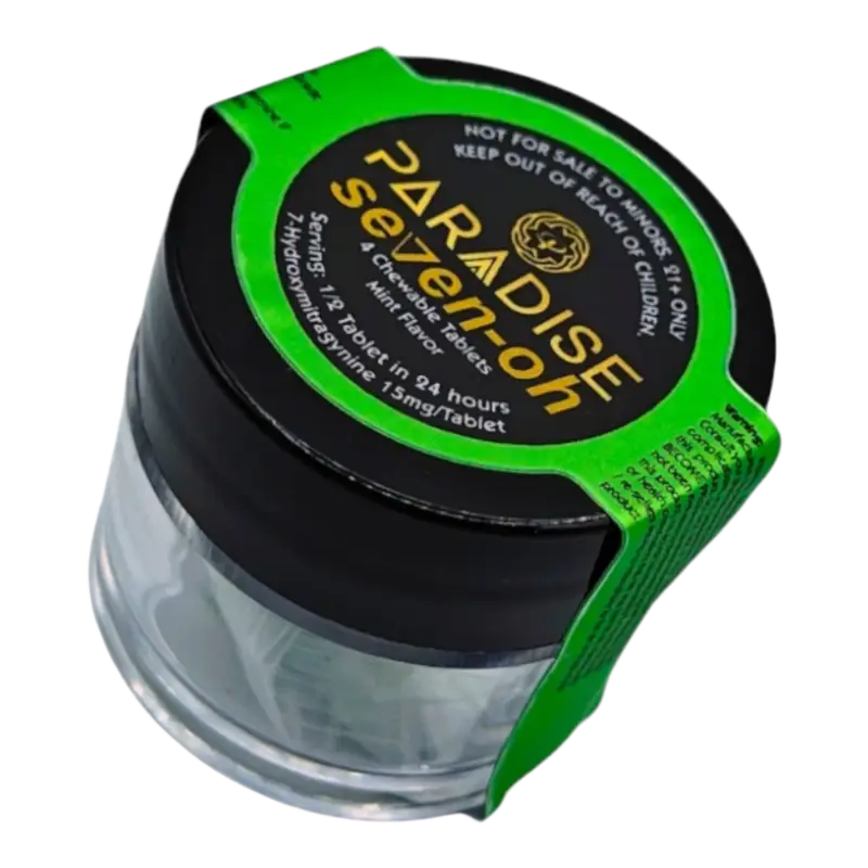 Clear glass jar with black lid and green accent band labeled ’Paradise Seeds’