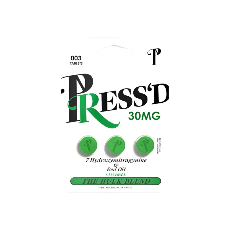 Stylized product packaging design for ’Press’d 30MG’ featuring green pills and text.